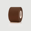 Roll of brown tape on a light gray background