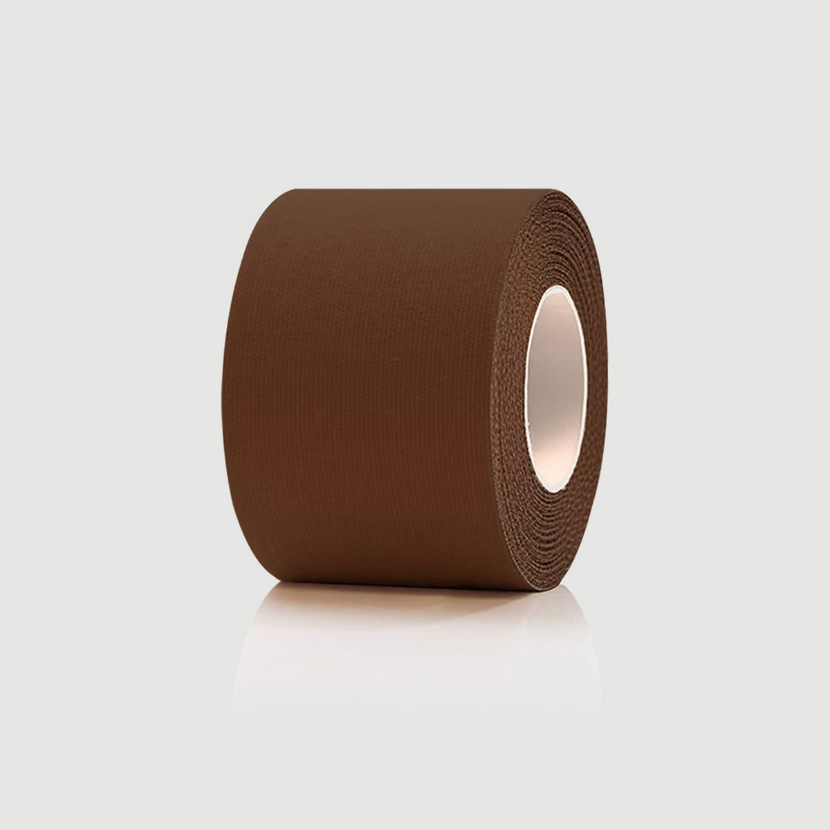 Roll of brown tape on a light gray background