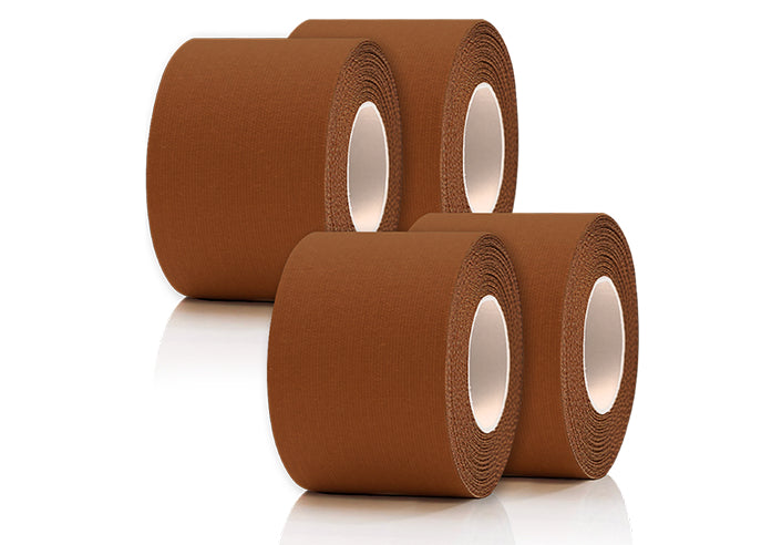Three rolls of brown tape on a white background