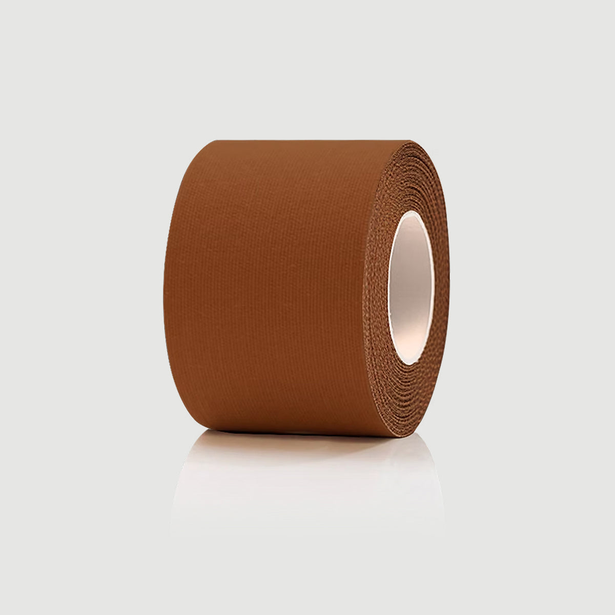 Roll of brown tape on a light gray background