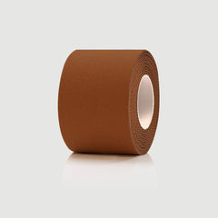 Roll of brown tape on a light gray background